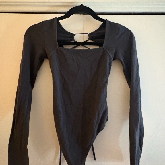 American Eagle Outfitters Tops - American Eagle Outfitters Charcoal Long Sleeve tie back Bodysuit
